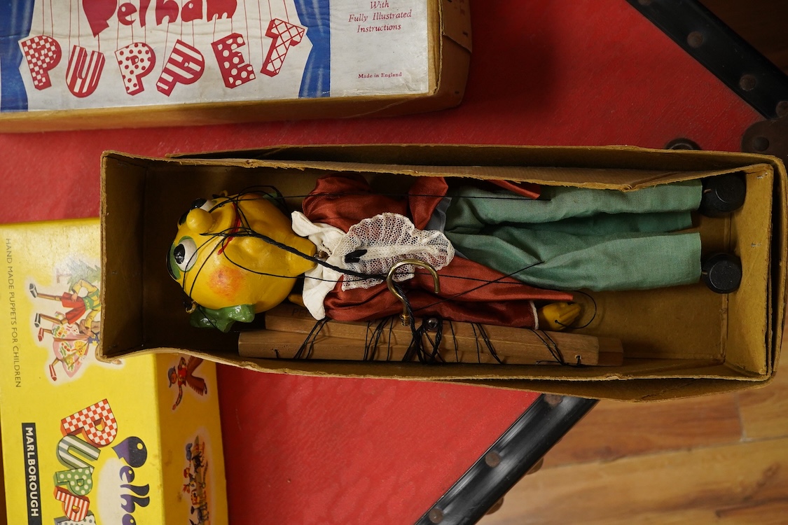 Five boxed Pelham Puppets including; a Type SL Hansel, Gretel, Bembo the Clown, the Policeman with moving mouth, Mr. Turnip